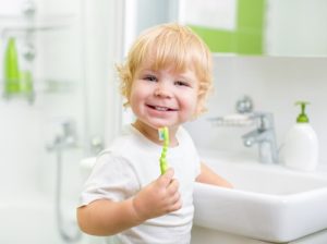 boy brushing teeth